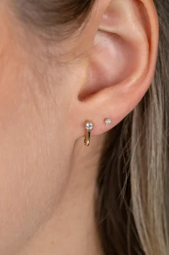 11mm ZINZI Gold 14 krt gouden oorringen ovaal model met witte zirconia en luxe klapsluiting ZGO566