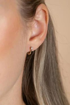 11mm ZINZI Gold 14 krt gouden oorringen ovaal model met witte zirconia en luxe klapsluiting ZGO566