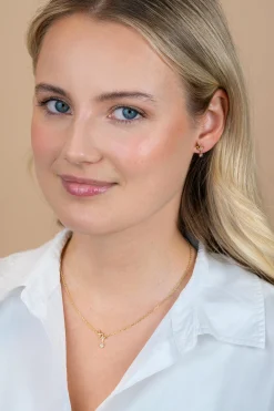 14,5mm ZINZI goldplated zilveren oorstekers 'sterrendans' met twee speelse sterren en bungelende witte zirkonia ZIO2837
