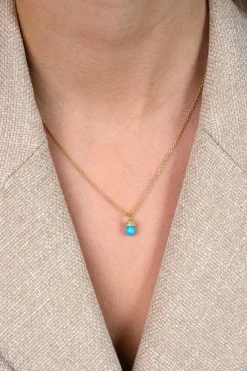 8mm ZINZI gold plated zilveren oorbedels met een turquoise parel en een strikvormige zetting bezet met witte zirkonia’s ZICH2863T (zonder oorringen)