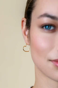 18mm ZINZI gold plated zilveren halve oorringen in hartvorm 1,4mm buisdikte met vlindersluiting ZIO2584G