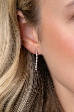 23mm ZINZI zilveren tennis oorstekers met rijzetting witte zirconia's ZIO2794