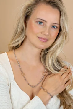 ZINZI bicolor zilveren schakelarmband met drie ovale goldplated schakels ZIA2785