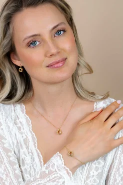 ZINZI gold plated zilveren armband met fijne ankerschakel en drie verbonden ringen ZIA2890G