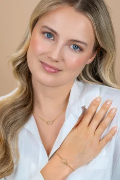 ZINZI goldplated zilveren armband met twee verbonden ronde schakels witte zirconia's ZIA1782Y