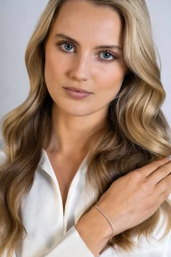 ZINZI gold plated zilveren armband, in het midden bezet met 21 witte zirconia's 16-19cm ZIA2370Y