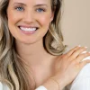 ZINZI gold plated zilveren armband met een speelse rij witte zirkonia’s in ronde zetting 3mm breed ZIA2893Y