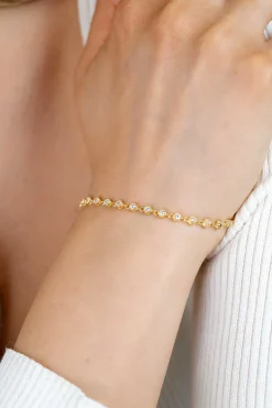 ZINZI gold plated zilveren armband met een speelse rij witte zirkonia’s in ronde zetting 3mm breed ZIA2893Y