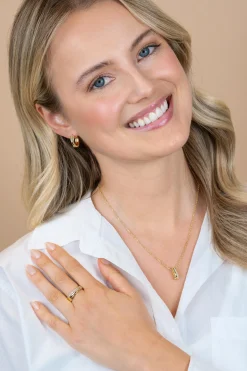 ZINZI goldplated zilveren brede cross-over ring glad witte zirkonia's ZIR2801