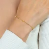 ZINZI gold plated zilveren fantasie armband met 5 geelgroene donuts en glanzende bolletjes 17-19,5cm ZIA2508