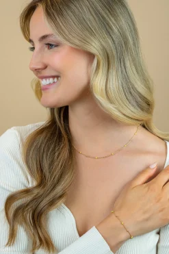 ZINZI gold plated zilveren fantasie armband met 5 geelgroene donuts en glanzende bolletjes 17-19,5cm ZIA2508