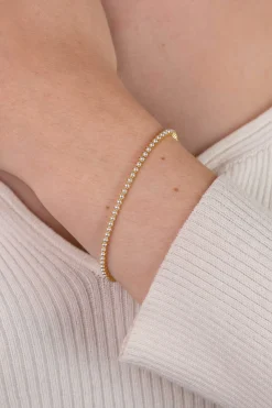 ZINZI gold plated zilveren tennisarmband 2,4mm breed bezet met een rij glanzende witte parels ZIA2910