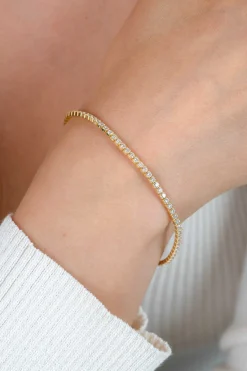 ZINZI gold plated zilveren tennis armband 2,1mm breed met rijzetting witte zirconia's ZIA2892