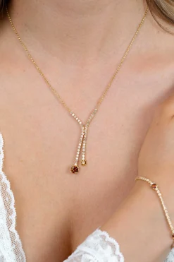 ZINZI gold plated zilveren Y-collier 45cm met luxe tennislook en champagnekleurige zirkonia's in rijzetting met twee grotere donkerbruine kleurstenen ZIC2894C