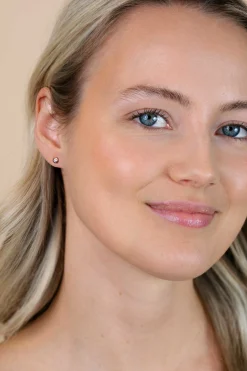 Zinzi zilveren oorknoppen 14K rosé verguld rond 4mm wit ZIO1177R