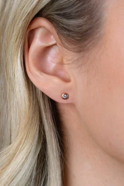 Zinzi zilveren oorknoppen 14K rosé verguld rond 4mm wit ZIO1177R