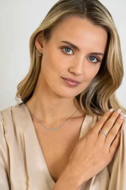 ZINZI zilveren oorstekers (13mm) met een open ovale vorm bezet met witte zirconia's ZIO2398